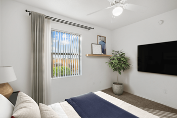 Bedroom with carpeted flooring